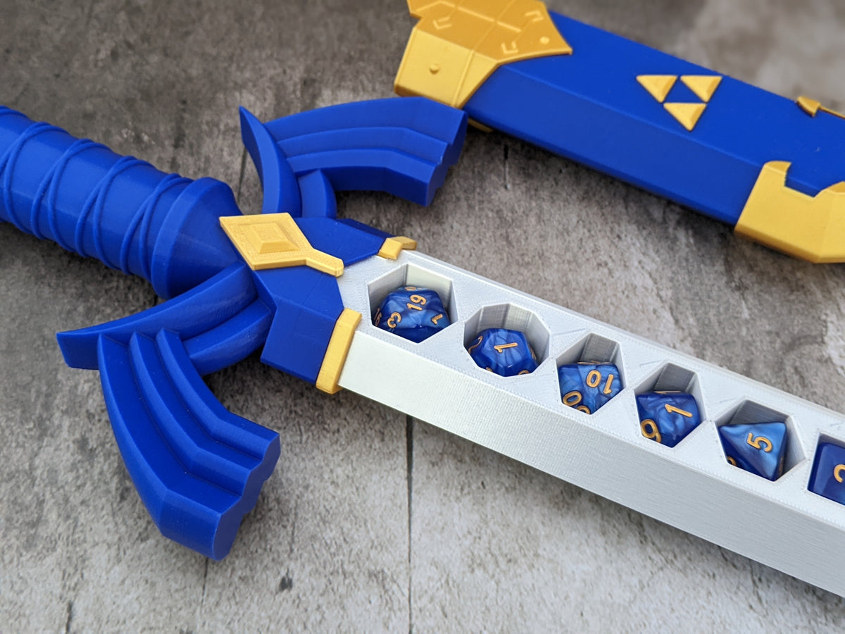 Close-up of the Master Dice Sword blade holding blue polyhedral dice