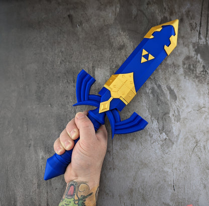 Hand holding the sheathed Master Dice Sword